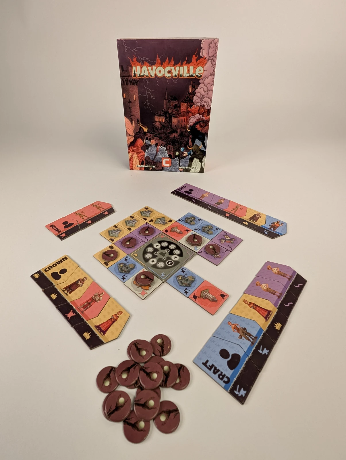 Havocville city tiles, faction boards, wooden markers, and game box