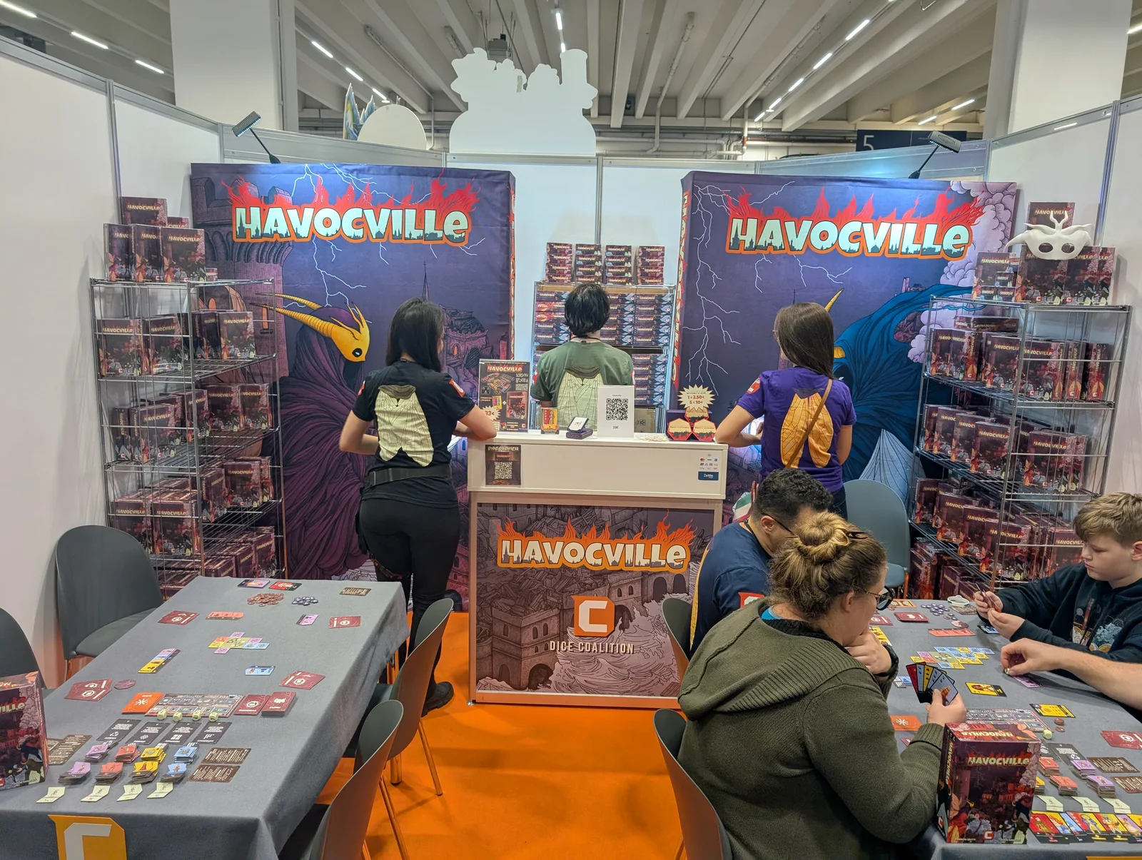 Visitors playing Havocville at the Dice Coalition booth